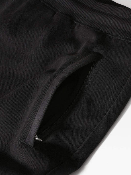 Pantalone Felpa The North Face Uomo Nero The North Face  Angolo dello Sport