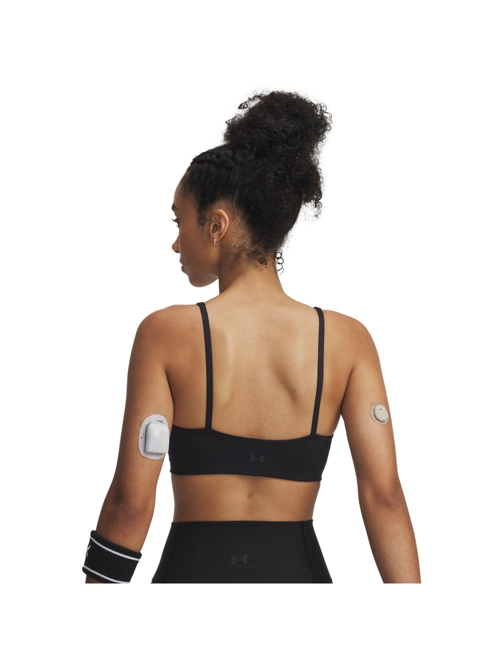 Top Sportivo Under Armour MOTION LOW Donna - Nero