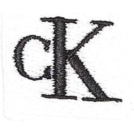 T-shirt CALVIN KLEIN Bambino MONO MINI BADGE REG Bianco CALVIN KLEIN  Angolo dello Sport