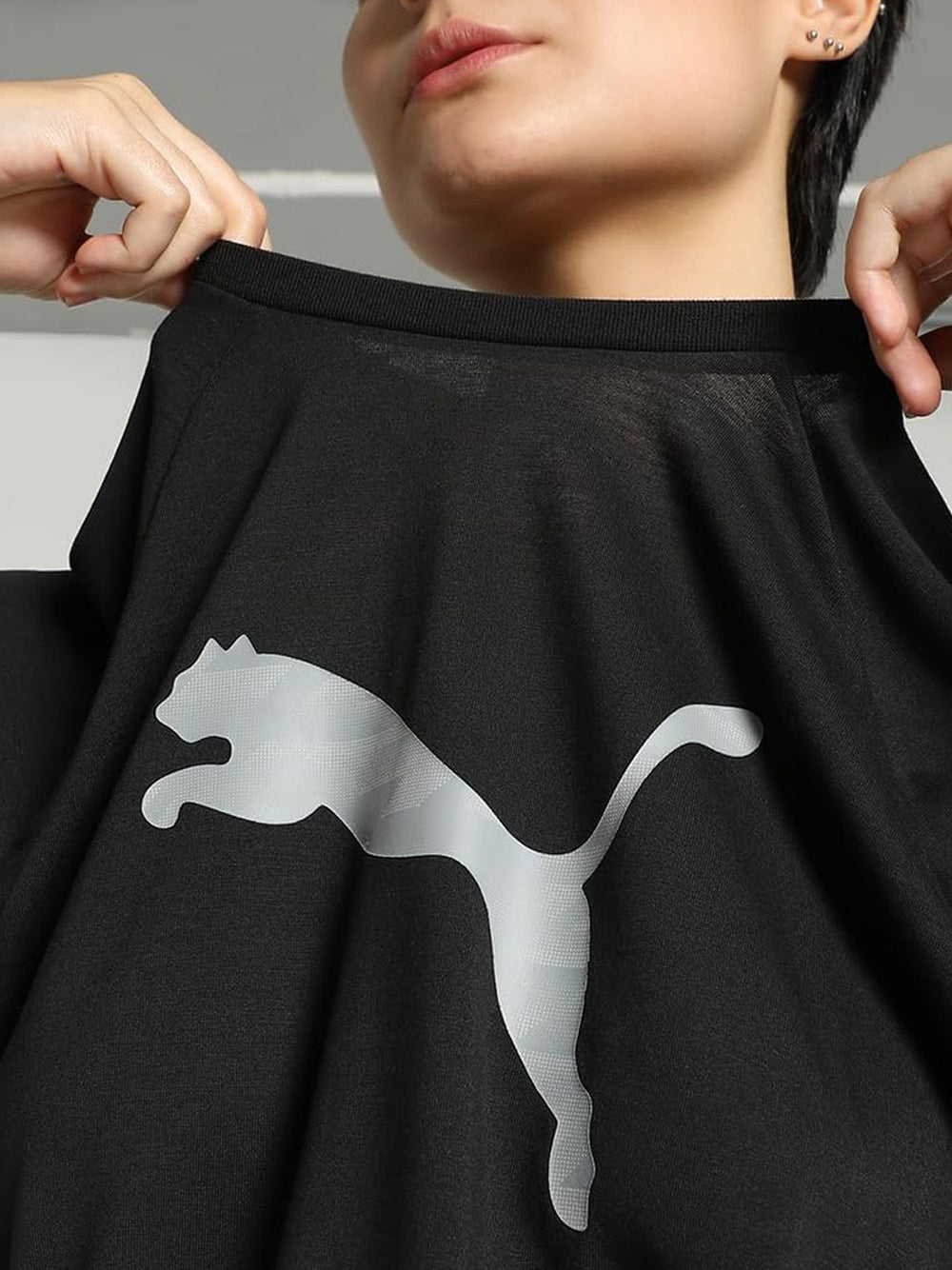 T-Shirt Sportiva Puma Donna Evostripe Graphic Nero Puma  Angolo dello Sport