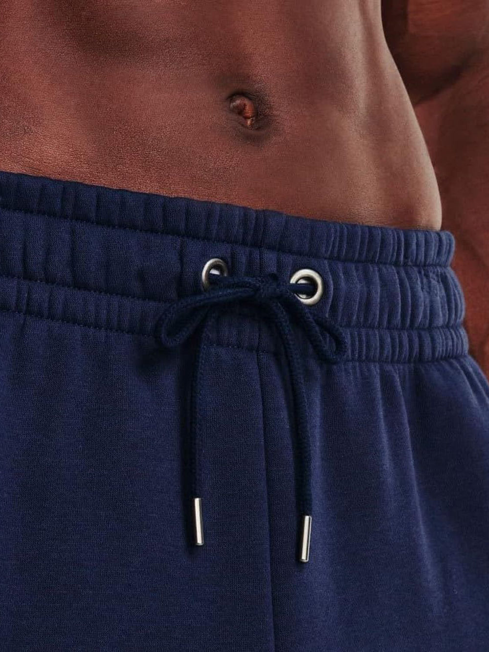 Pantalone Felpa Under Armour Uomo Blu Under Armour  Angolo dello Sport