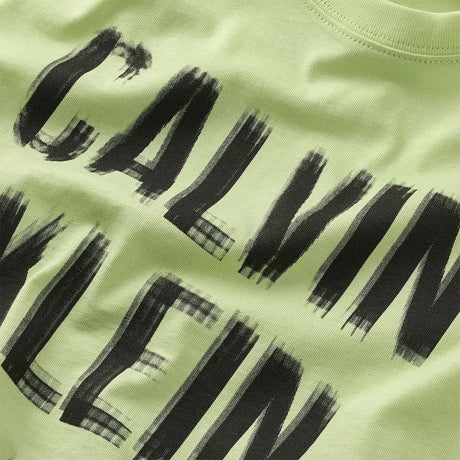 T-shirt CALVIN KLEIN Bambino PIXEL LOGO RELAXED Turchese CALVIN KLEIN  Angolo dello Sport